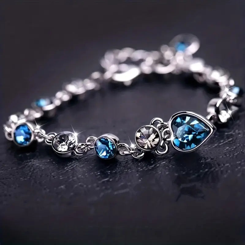 ZEVORA Ocean Heart Glow Bracelet – Handmade White Gold & Sapphire Jewelry