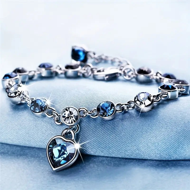 ZEVORA Ocean Heart Glow Bracelet – Handmade White Gold & Sapphire Jewelry