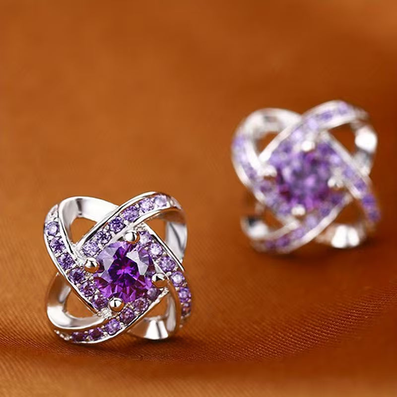 ZEVORA Purple Crystal Knot Earrings – White Gold Amethyst Knot Stud Earrings