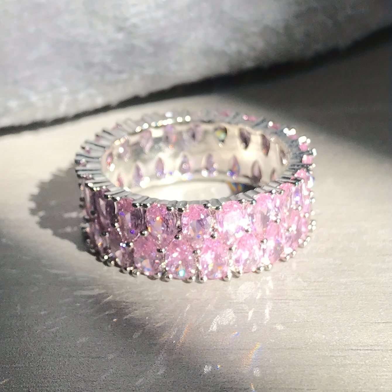 ZEVORA Blush Cascade Eternity Ring – Handmade White Gold & Pink Sapphire Jewelry