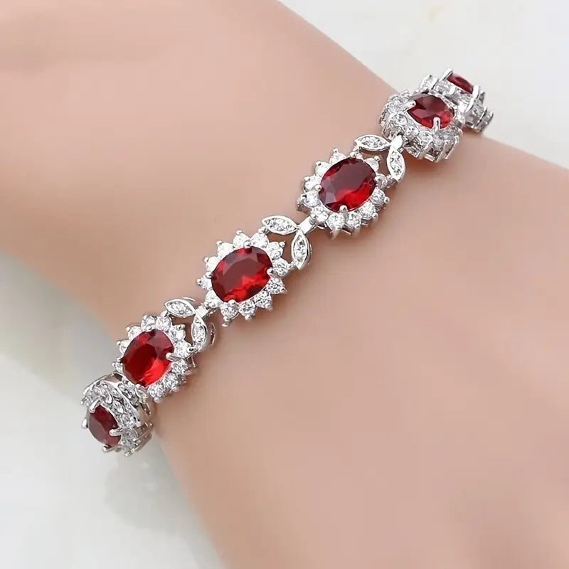 ZEVORA Iridessa Raventhorn Bracelet – Handmade White Gold & Ruby Jewelry