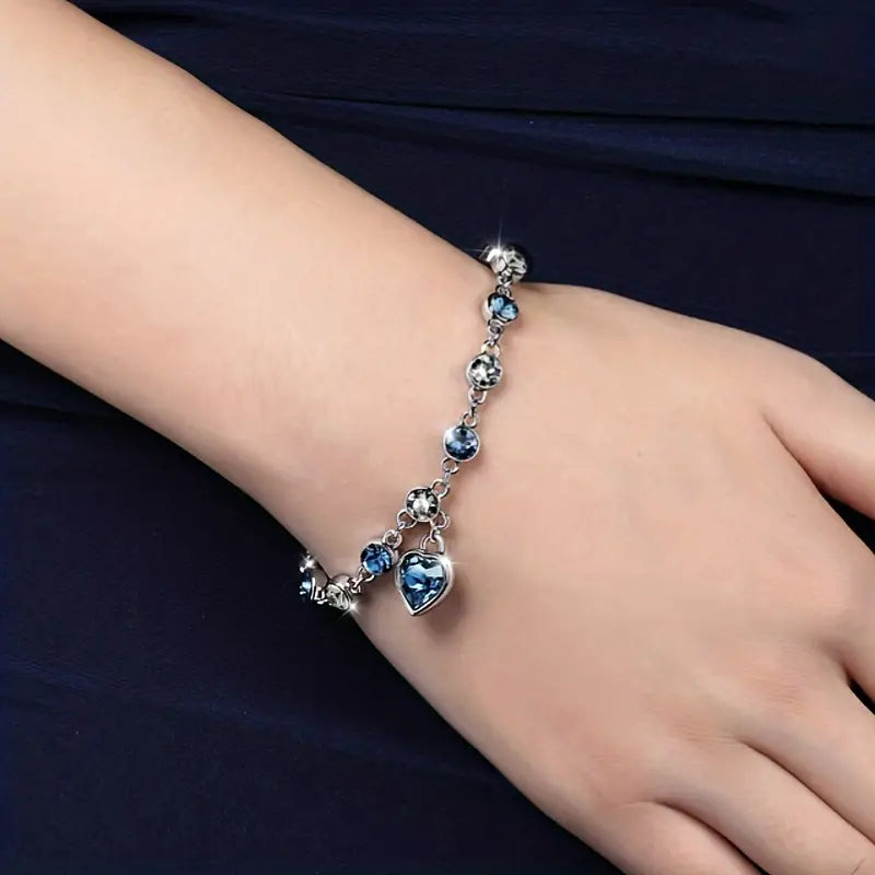 ZEVORA Ocean Heart Glow Bracelet – Handmade White Gold & Sapphire Jewelry