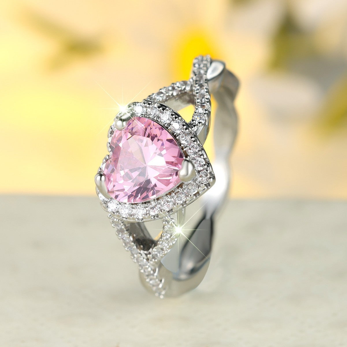 ZEVORA Amour Twist Halo Ring – Handmade White Gold & Pink Sapphire Jewelry