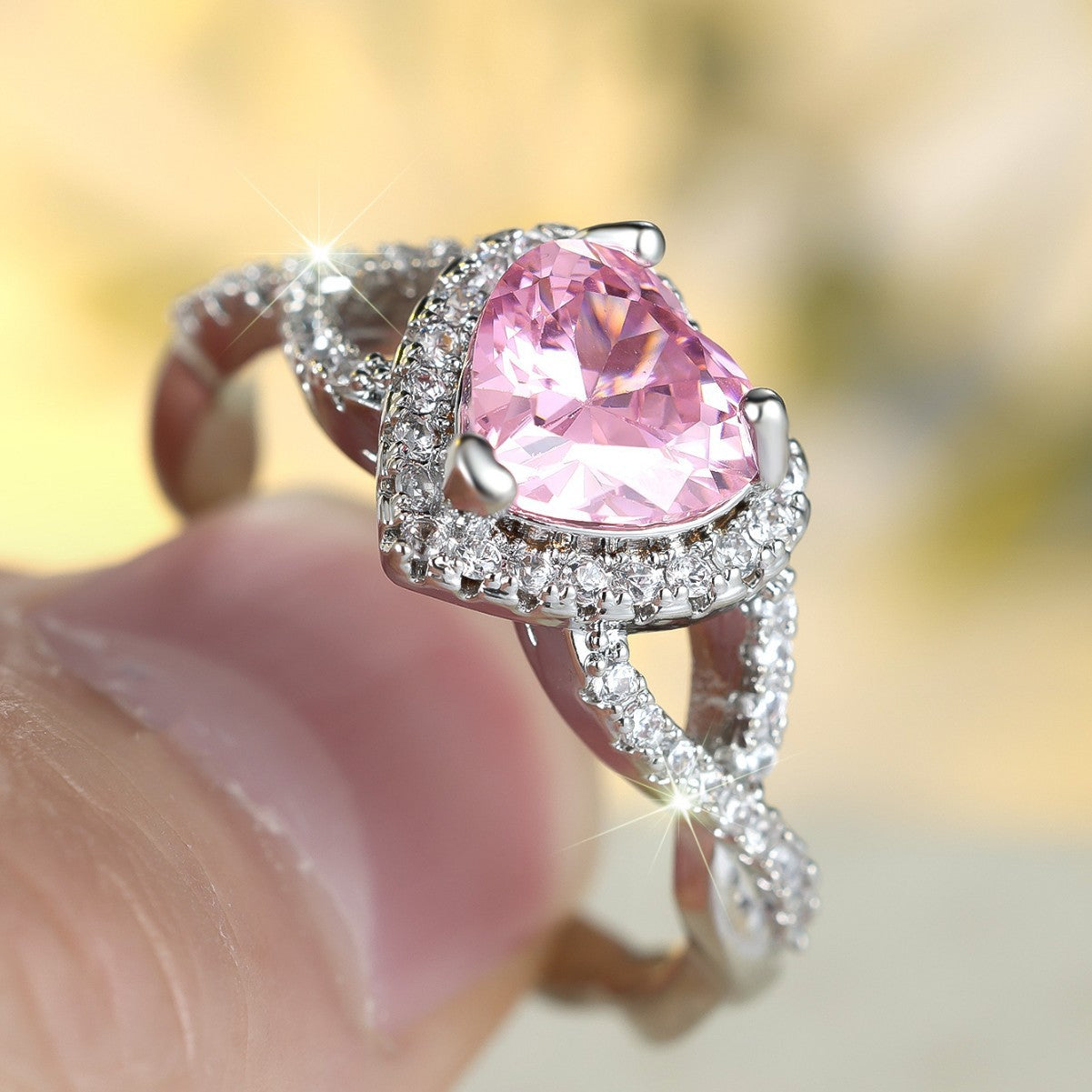 ZEVORA Amour Twist Halo Ring – Handmade White Gold & Pink Sapphire Jewelry