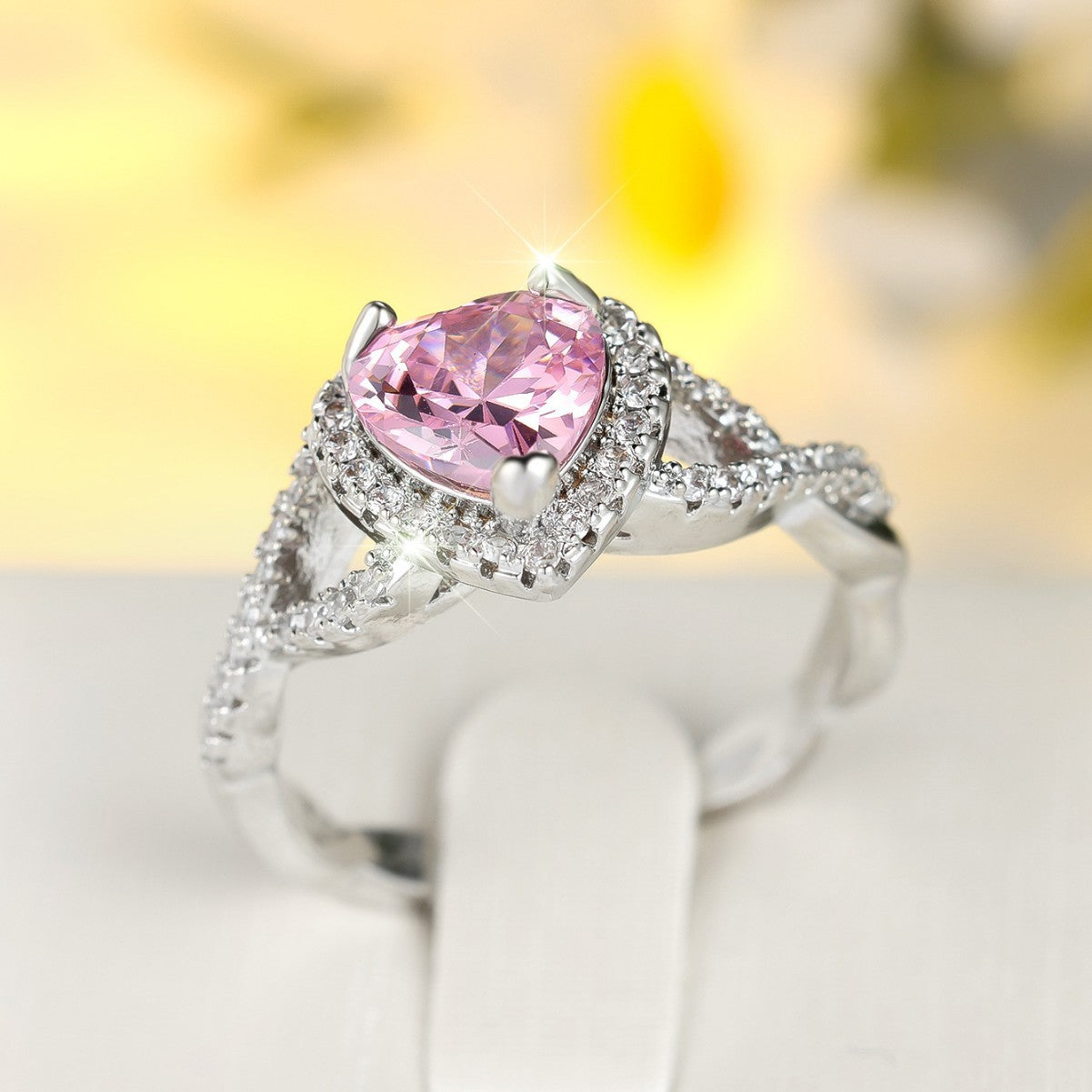 ZEVORA Amour Twist Halo Ring – Handmade White Gold & Pink Sapphire Jewelry