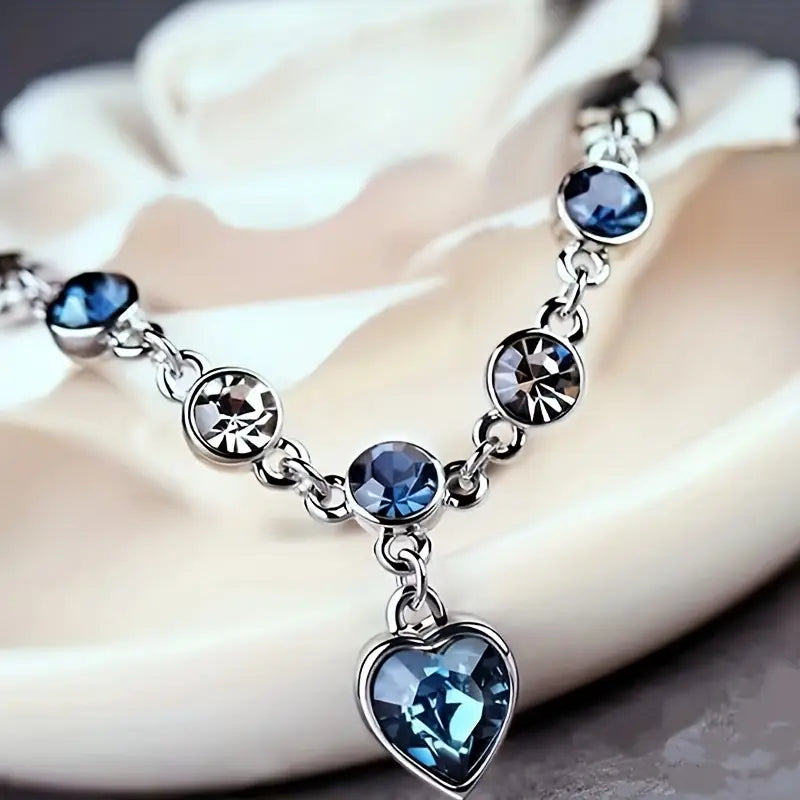 ZEVORA Ocean Heart Glow Bracelet – Handmade White Gold & Sapphire Jewelry