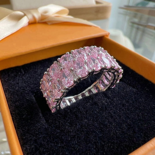 ZEVORA Blush Cascade Eternity Ring – Handmade White Gold & Pink Sapphire Jewelry